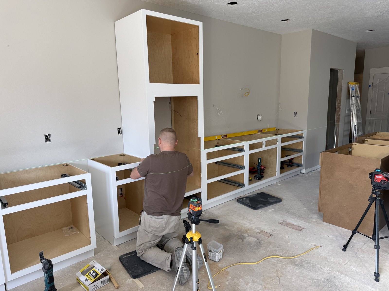 Cabinetry and tile work during the rebuild