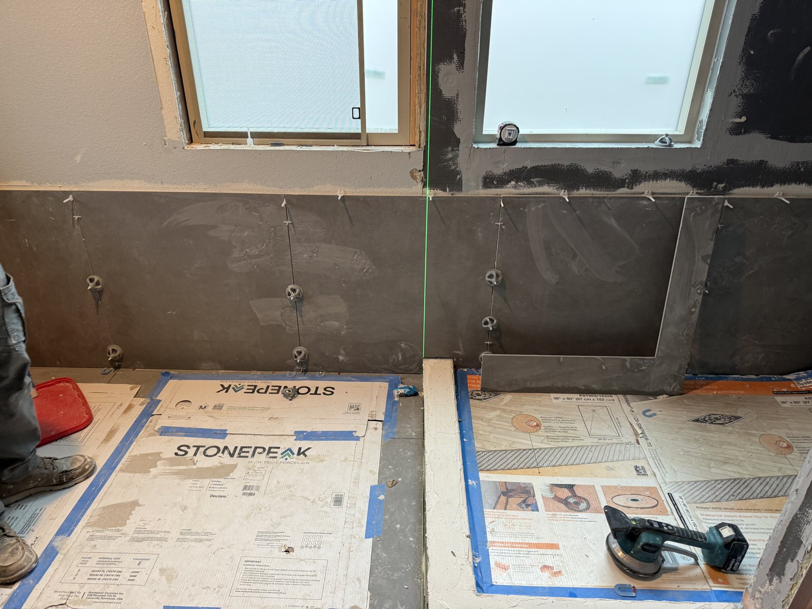 Cabinetry and tile work during the rebuild